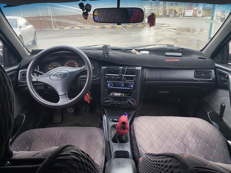 Тойота Carina e