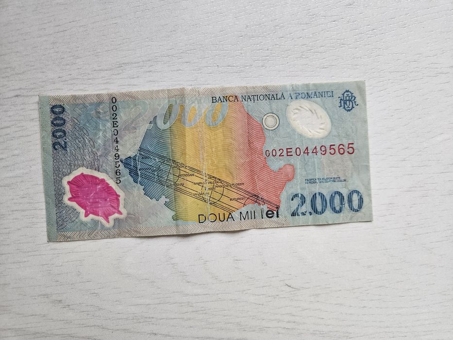 Vand bancnotă 2000 lei cu eclipsa 1999