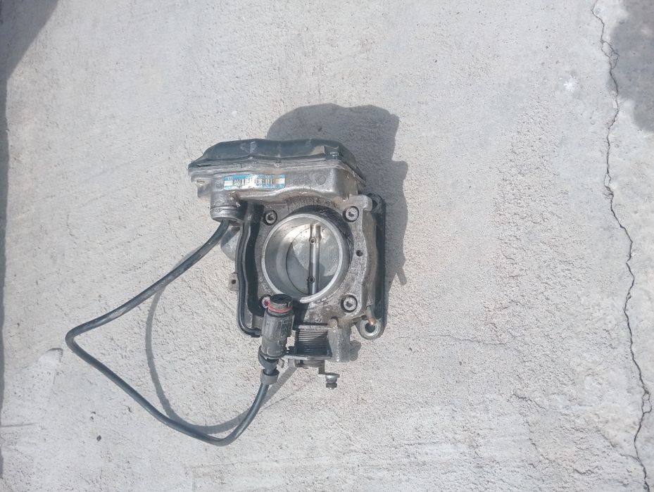 Дроссельная заслонка