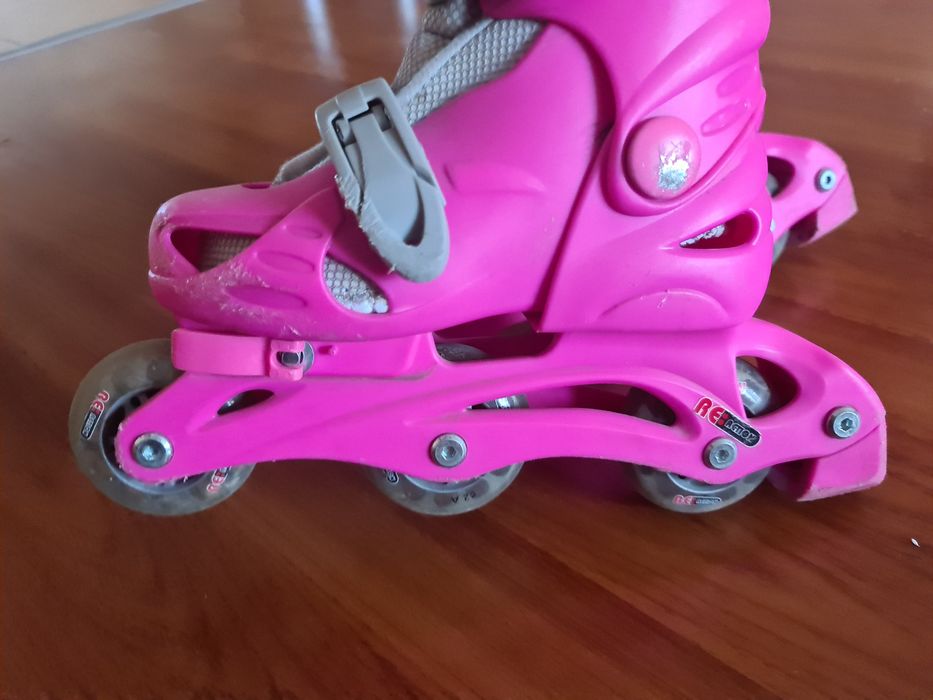 Роликовые коньки