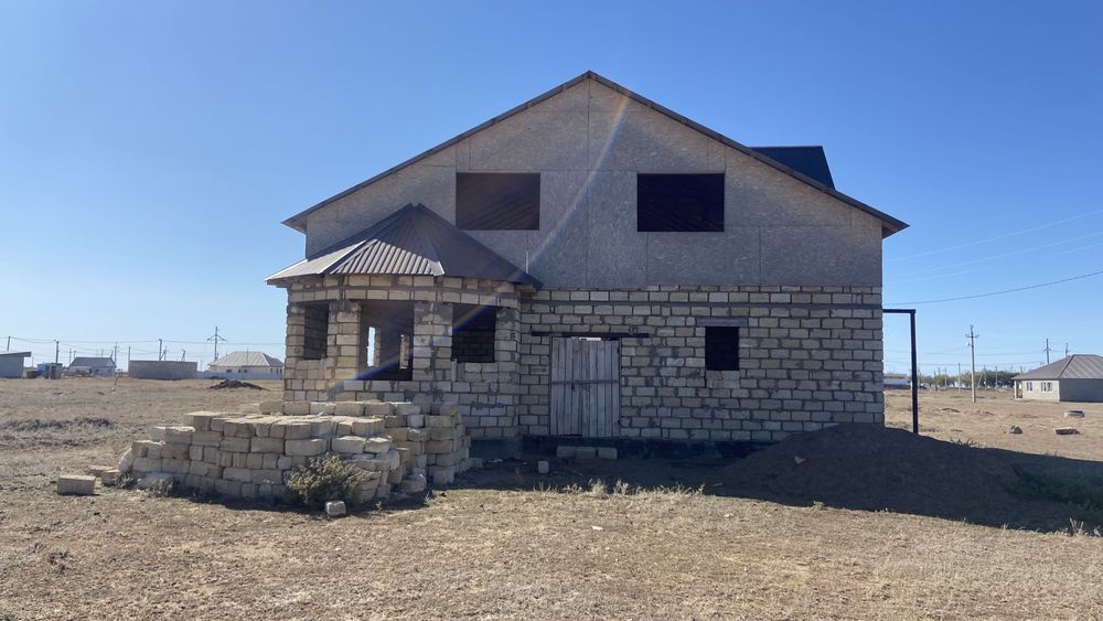 Мансардный дом,не до стройный