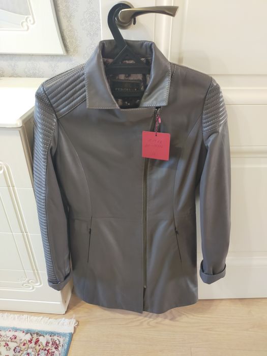 Плащь женский новый, кожанный