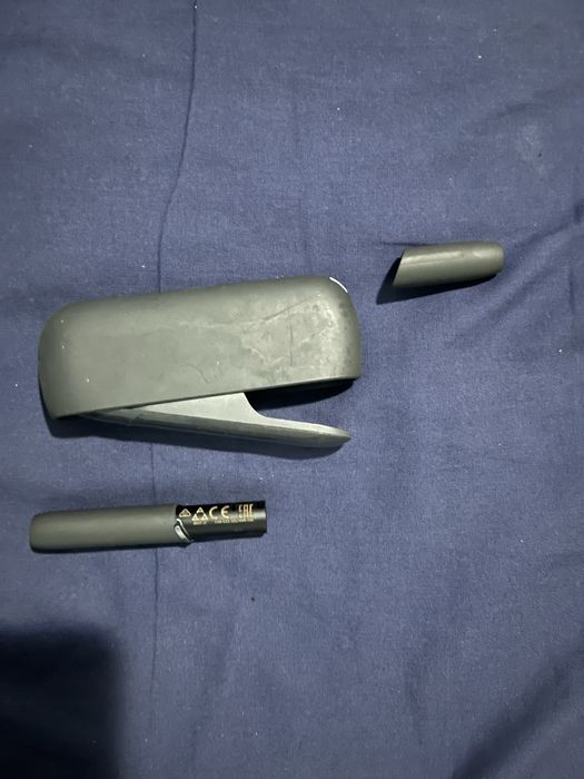 IQOS , tigara electronică.