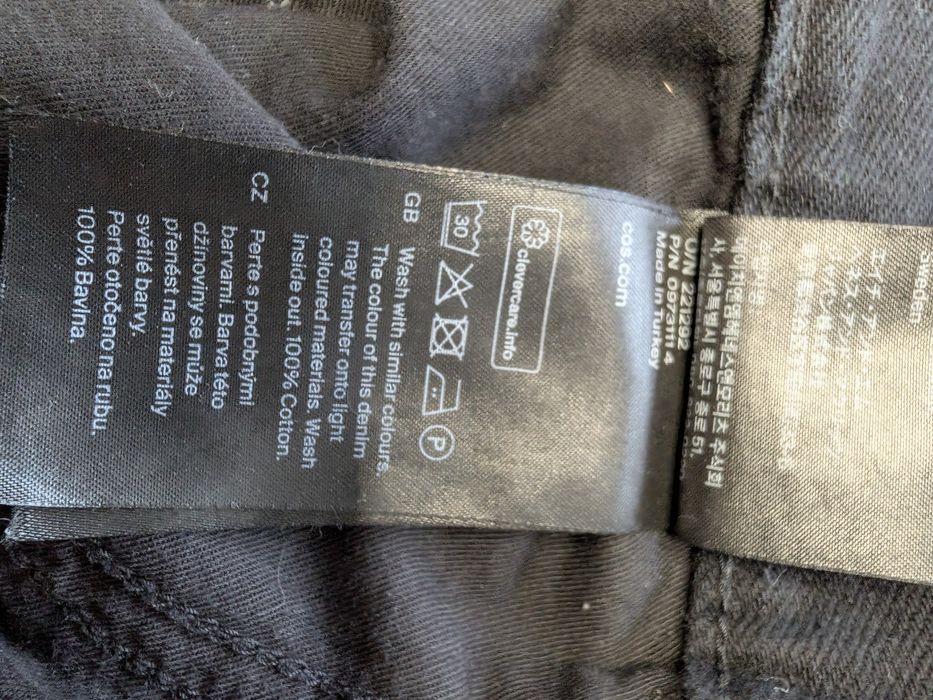 Blugi negri COS Relaxed Flare – talie înaltă, stil elegant, 100% bumba