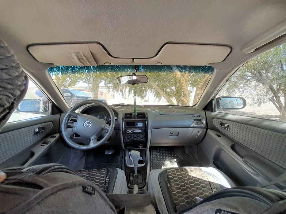 Мазда 626 птичка