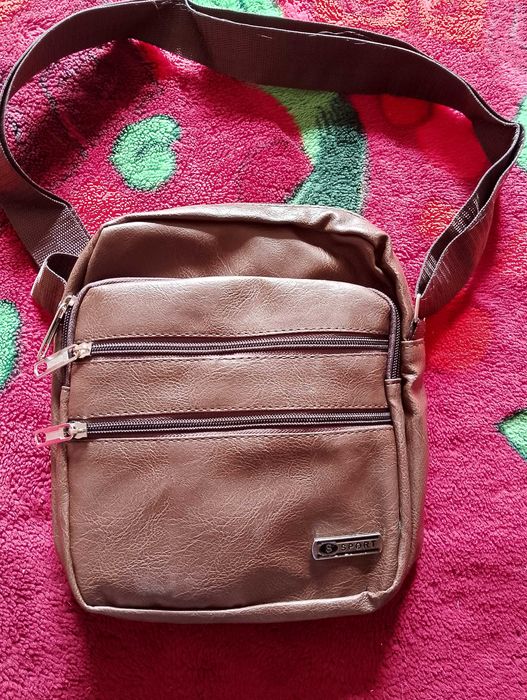 Барсетка новая...