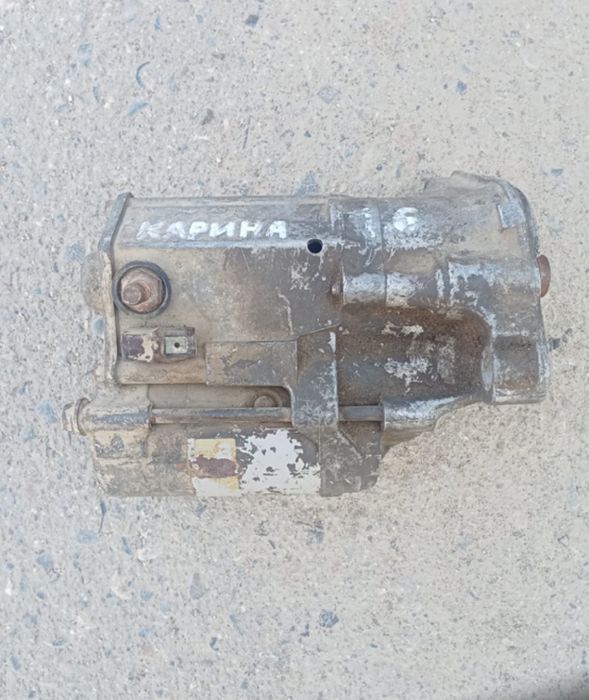 Стартер карина Е