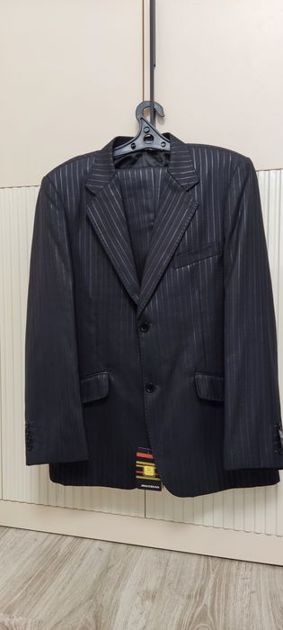 Костюмы мужские новые