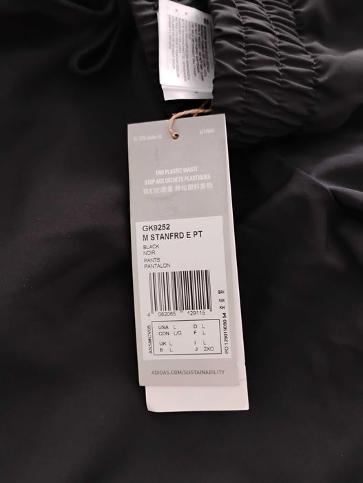 Неизползван анцуг Adidas размер L 100% полиестер ( с етикета)