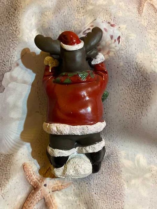 Figurina din ceramica,cu  binoclu ce se aprinde  pe baza de baterii