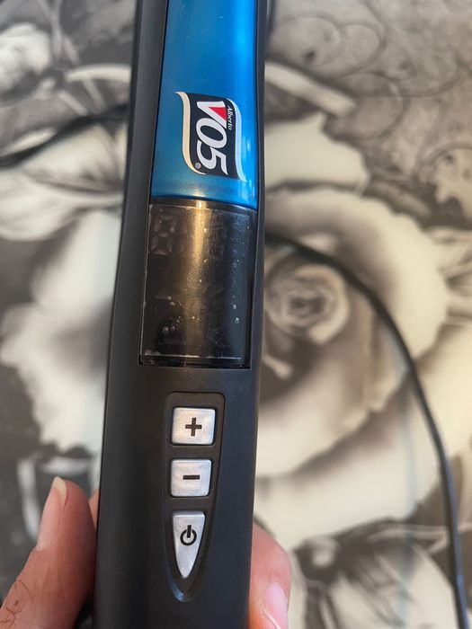 Преса за коса за исправяне и накъдраване