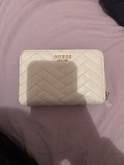 Портомне на GUESS