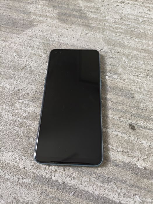 OPPO Reno4 Lite в бирюзовом цвете