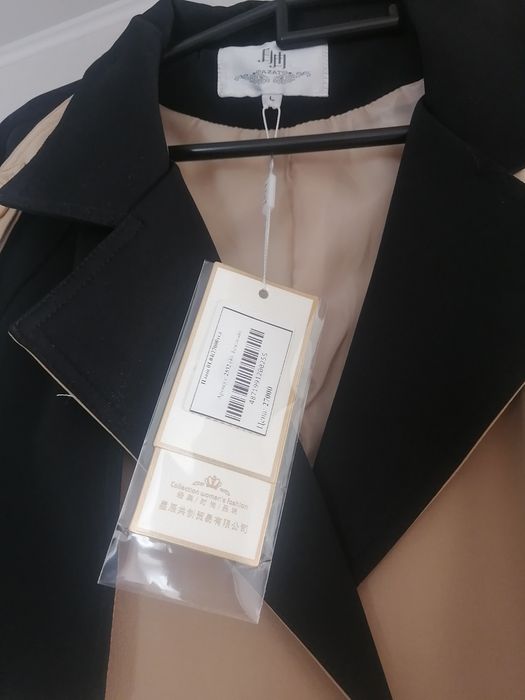 Продам тренч новый 10000