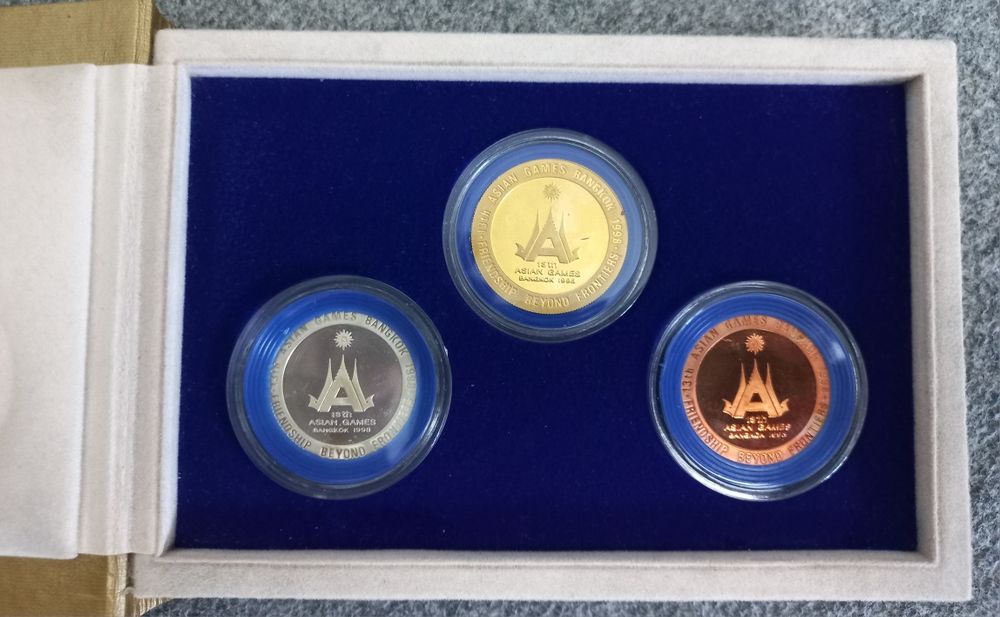 Продам монеты 13 Азиатские игры