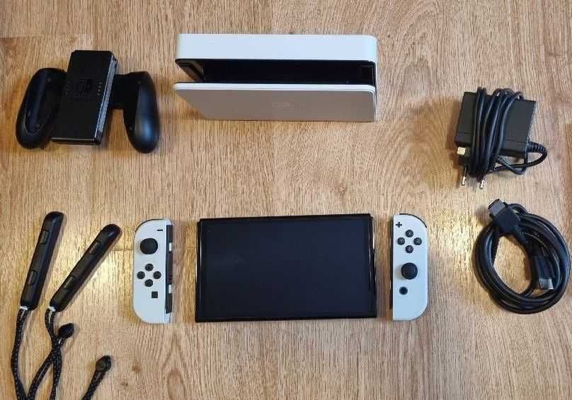 PRET FIX Nintendo Switch OLED impecabil pachet complet