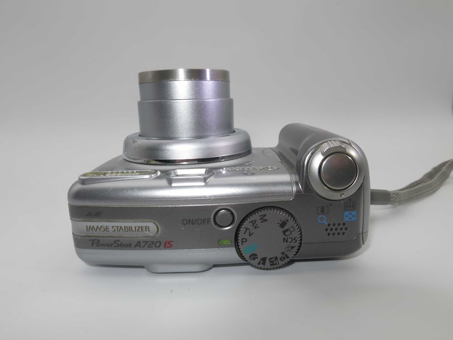 Canon PowerShot A720 компактен цифров фотоапарат, дигитална камера, в отлично състояние, тествана и работи перфектно с оригинална кутия и карта памет