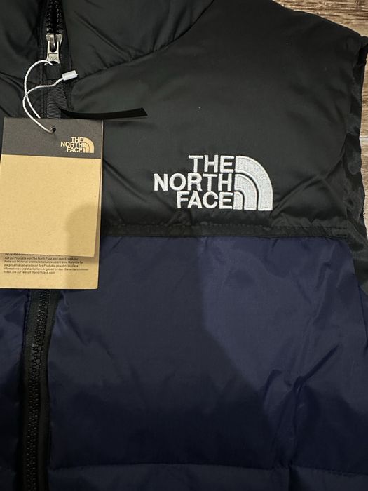 The North Face жилетка пух