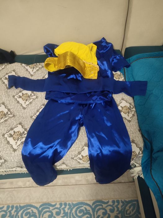 Детские костюмы  размер 38.34