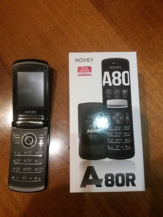 Продается сотовый телефон NOVEY А80R, раскладной.
