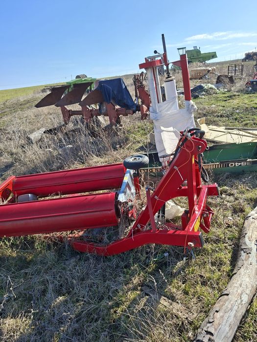 Infoliator și clește pentru baloți de siloz