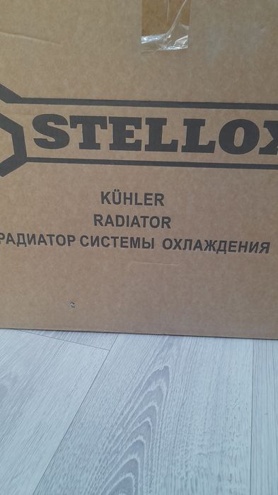 Радиатор охлаждения мазда3 2006год