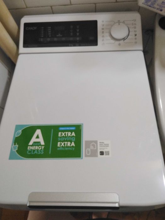 Vand masina de spalat verticala CANDY 1200 rpm,casa A,,folosita 4 luni,inca in garantie.Silentioasa,spala impecabil.