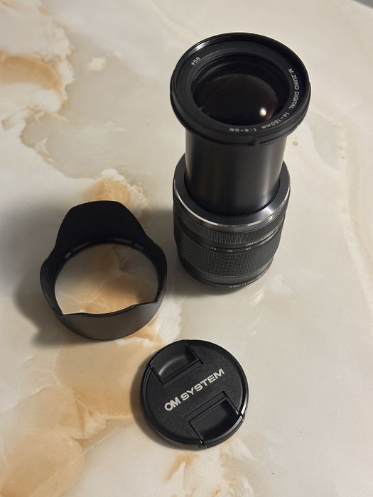 Обектив M.Zuiko ED 14-150mm f/4-5.6 II с подарък сенник