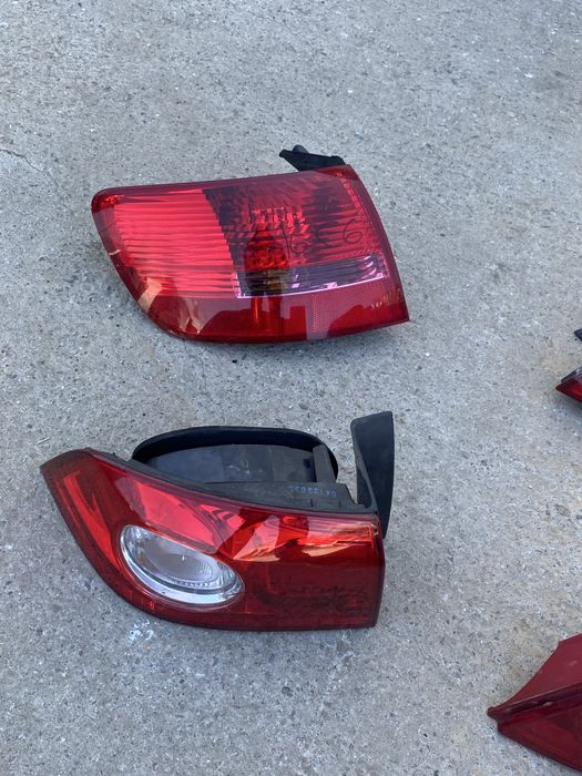 Pachet stopuri Stop lampa tripla stanga dreapta vw beetle renault laguna 2 megane 2 peugeot 307 / 208 terano kia a6c6 range rover detalii la telefon