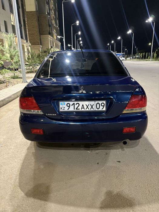 Мицубиси Лансер 9