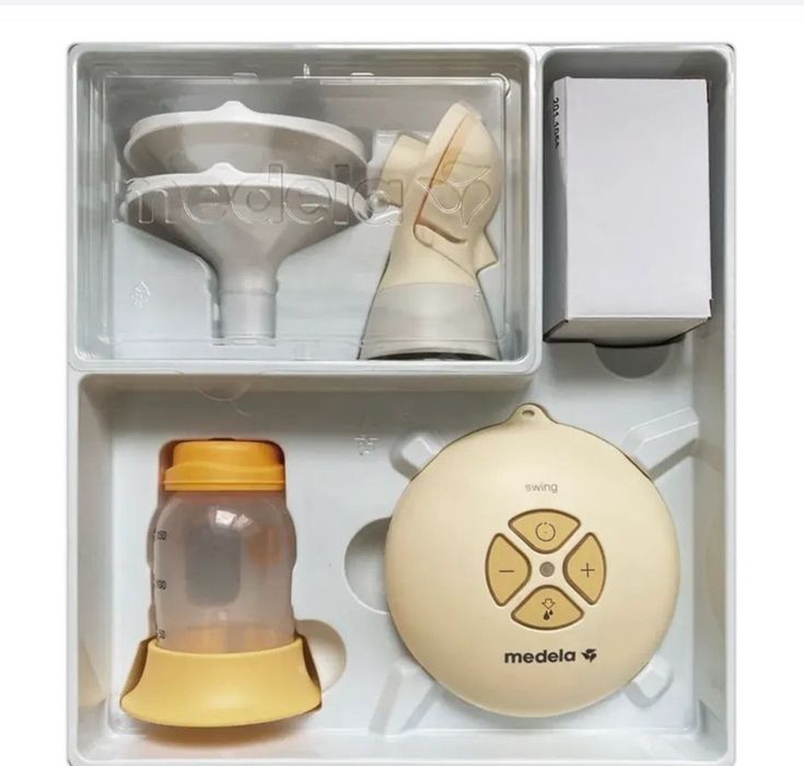 Молокоотсос Medela swing flex