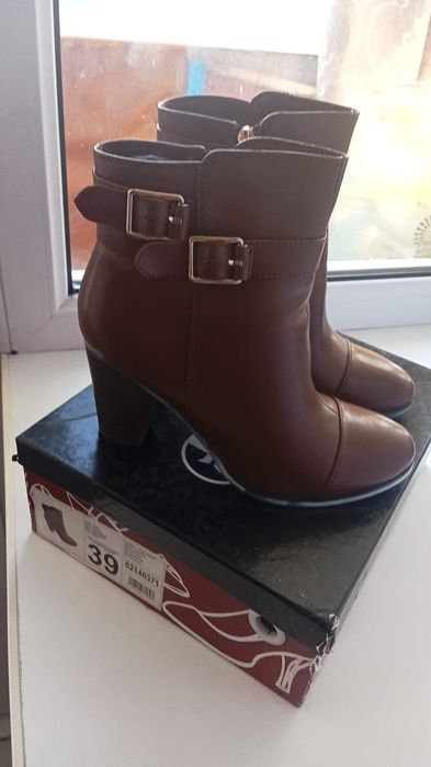 Продам новые сапоги