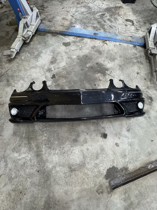 Передный бампер W211