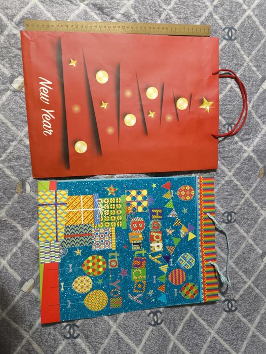 Брендовые и подарочные бумажные пакеты