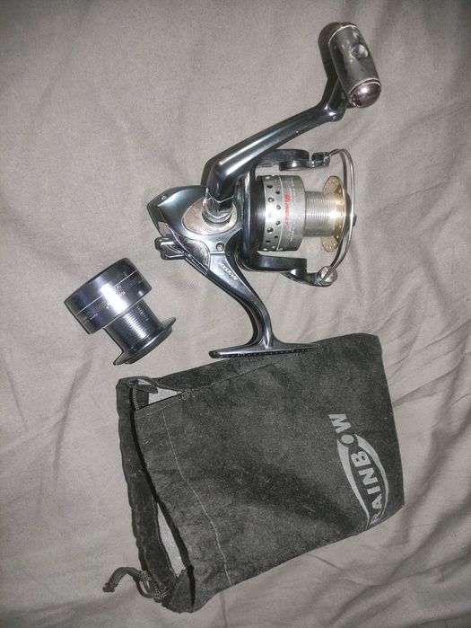 Mulineta pescuit cu 7 rulmenti ca noua cu tambur de rezerva