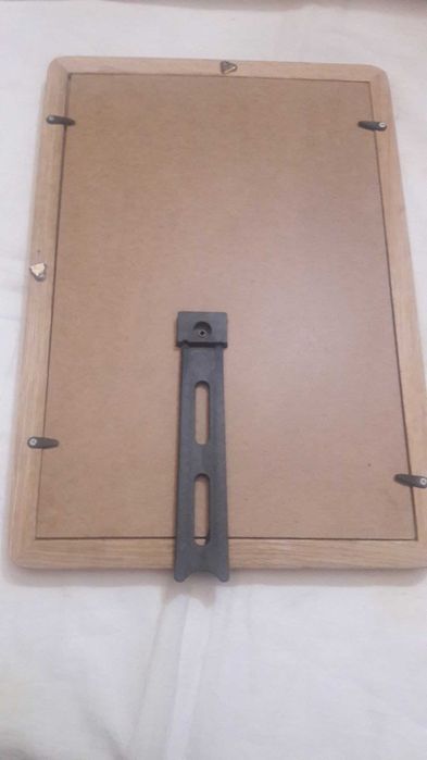 Золотые доллары США в рамке. Оформление из трёх штук