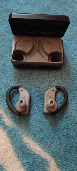 Căști Bluetooth cu dock
