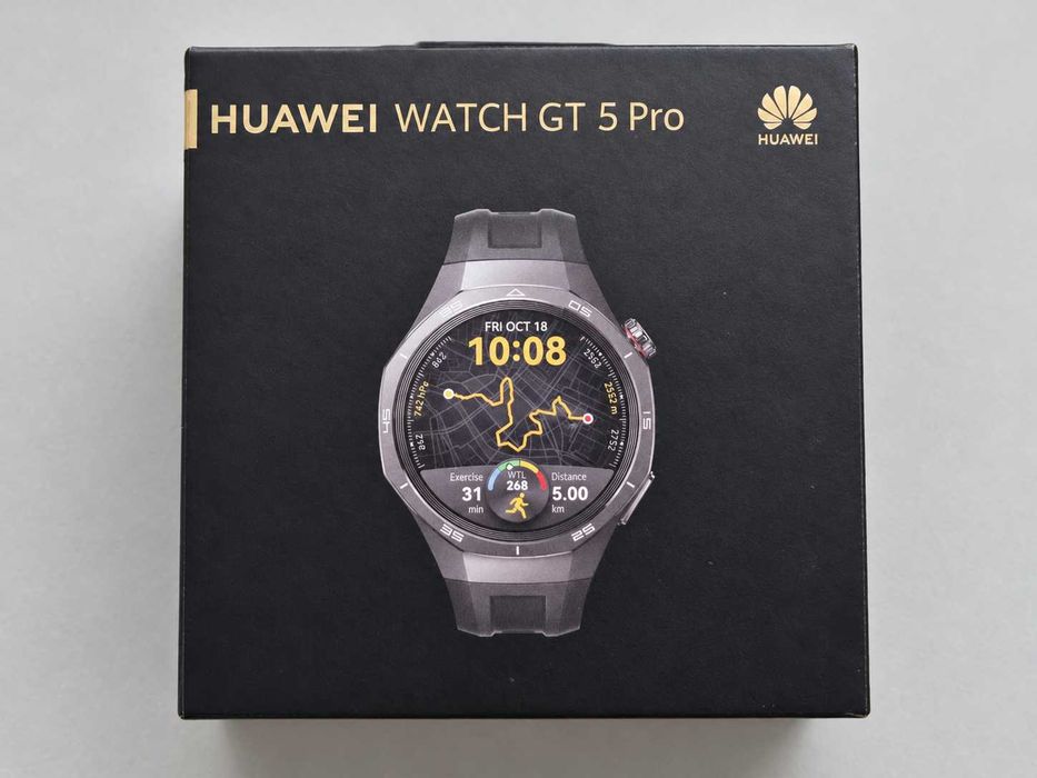 Vând Huawei Watch GT 5 Pro, 46 mm, varianta Black, cu carcasă din titan și curea originală neagră din fluoroelastomer.