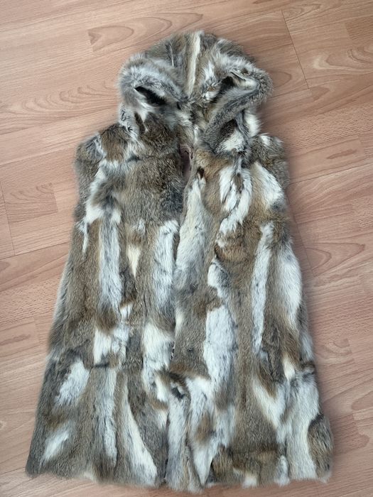 Дамски пухени елеци