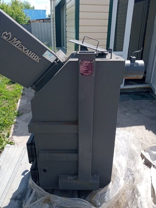 Котёл длительного горения Механик