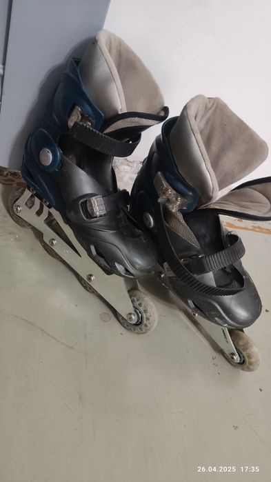 Роликовые коньки