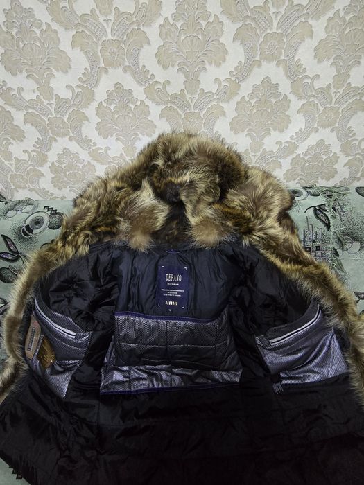 Пуховик новый...