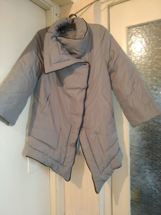 Пуховик на сельтепоне