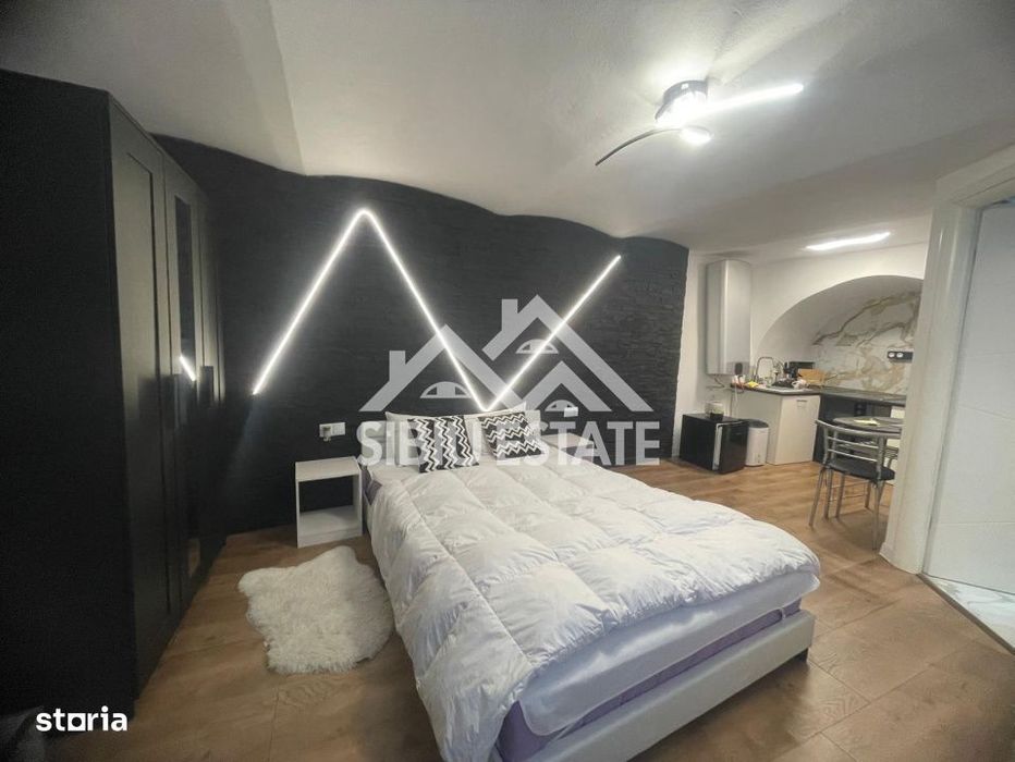 Garsonieră modernă, de vanzare, ultracentral–ideală pentru locuit sau