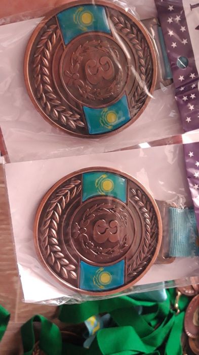 Медаль новая,город