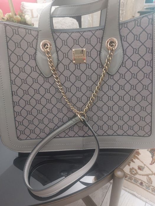 Нова,оригинална чанта на River island,удобна,практична,стилна