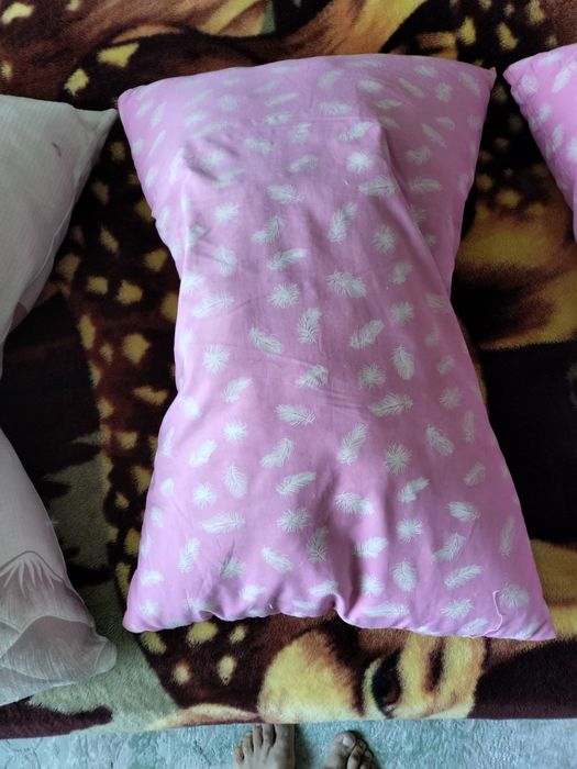 Пуховые подушки.