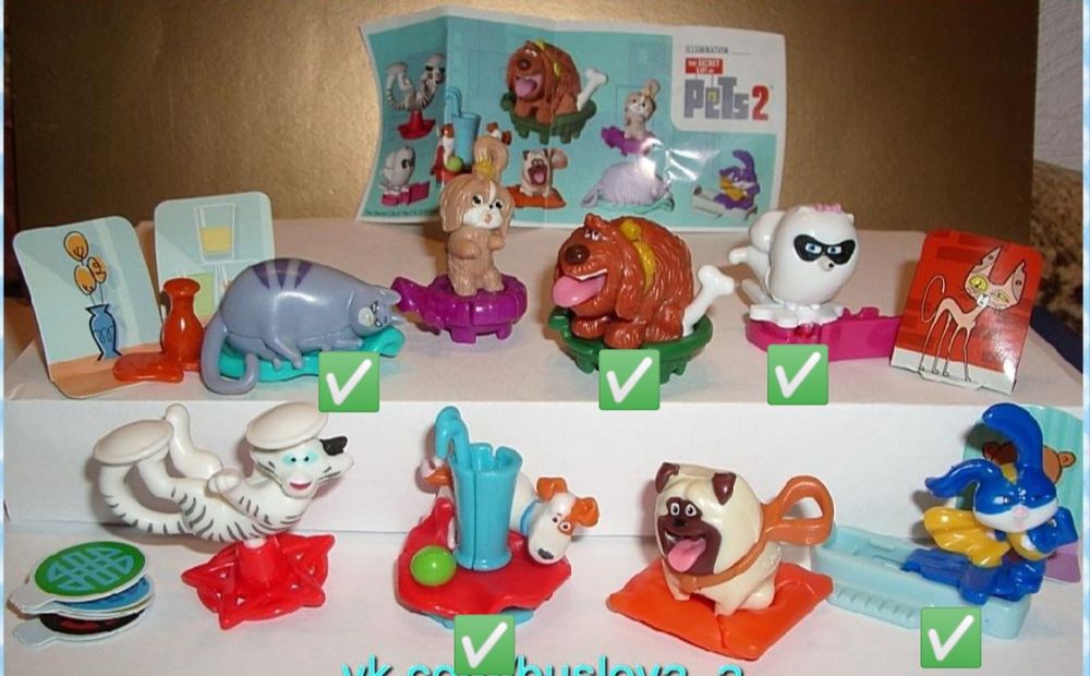 Фигурки Kinder в капсулах с вкладышами