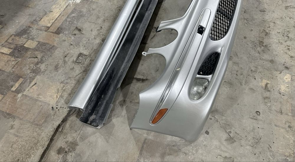 Бампер передней w211