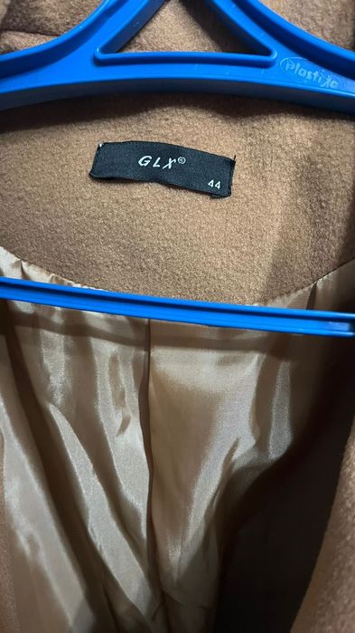 Продам пальто новое